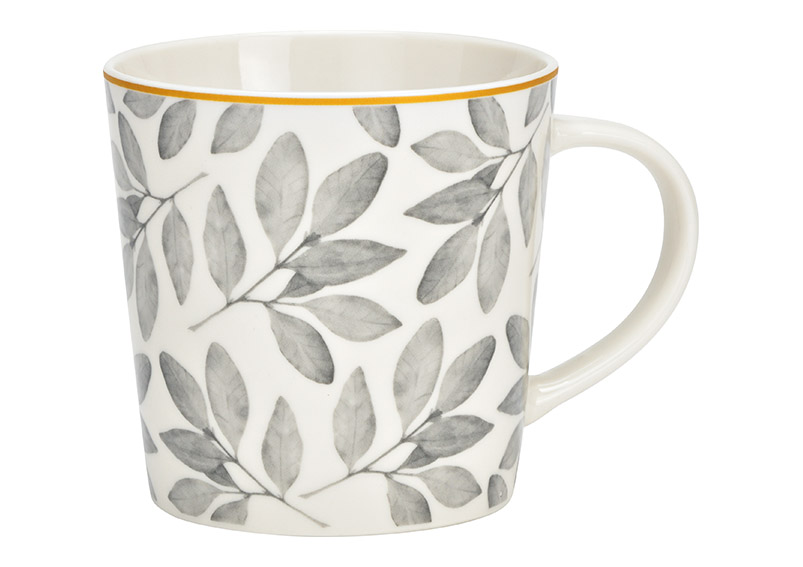 Eine Porzellan Tasse mit grauen Blaetter Dekor